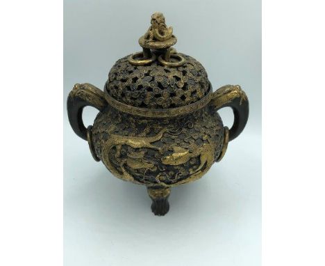 C19th gilded &amp; black iron  circular censer decorated all over with dragons &amp; foliage, pierced lid with dragon finial 