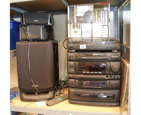 Aiwa HiFi system, cassette, radio, triple CD, record player, five speakers an a Z-2300 karaoke facility, with a box of casett