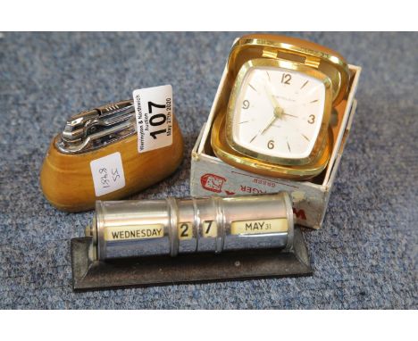 Ronson table lighter a westclox alarm clock and a vintage desk perpetual calendar. P&amp;P Group 1 (£14+VAT for the first lot
