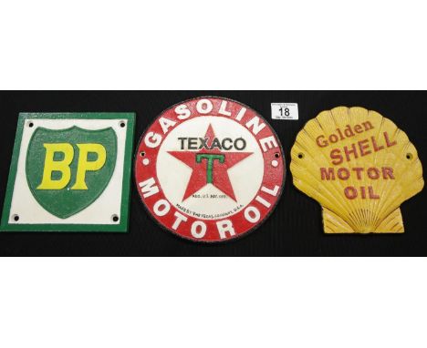 Three cast iron signs Texaco, BP and Shell Texaco. P&amp;P Group 2 (£18+VAT for the first lot and £2+VAT for subsequent lots)