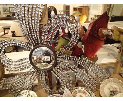 Three pieces of Contemporary wall art in the form of ladies shopping with a fancy bullseye mirror. This lot is not available 