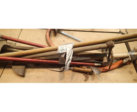 Mixed garden tools and a saw. This lot is not available for in-house P&amp;P, please contact the office for more information.