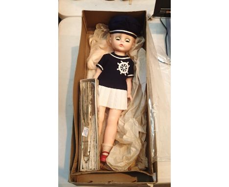 Boxed sailor doll with blonde hair by Fullar and a fan. P&amp;P Group 1 (£14+VAT for the first lot and £1+VAT for subsequent 