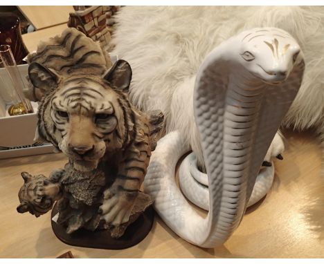 Cast resin tiger with cub and a ceramic hooded King Cobra model. This lot is not available for in-house P&amp;P, please conta