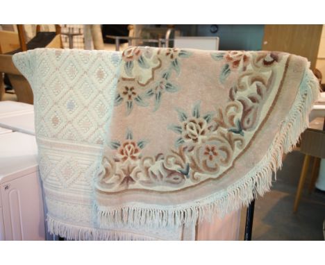 Two woollen rugs one oval and other oblong. P&amp;P Group 3 (£25+VAT for the first lot and £5+VAT for subsequent lots) 
