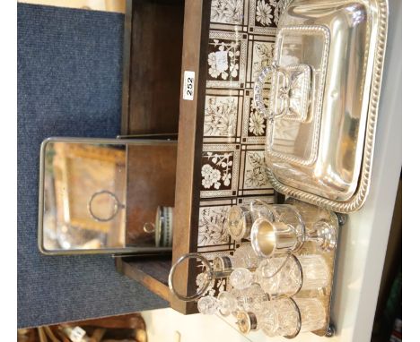 Collection of plated silverware including lidded travel mirror, a tiled planter box and a stoneware jug.This lot is not avail
