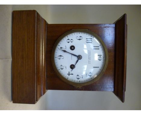 An early 20thC mahogany cased bracket clock, having a platform top, over straight sides and a deep plinth; the 8 day gong str