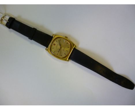 An Omega 720 Hz yellow metal and stainless steel cased chronometer wristwatch, faced by a patterned baton dial with a date ap