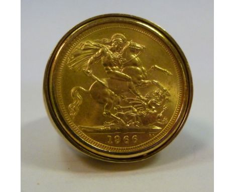 A 9ct gold signet ring, set with an Elizabeth II sovereign, the monarch's profile portrait verso 1966