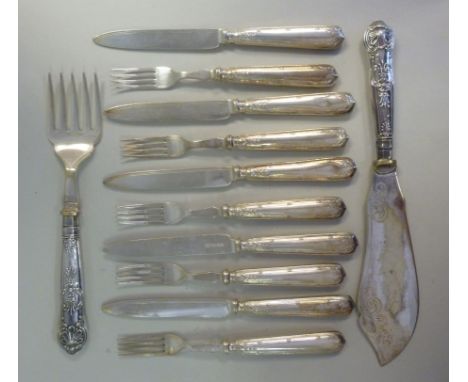 Silver plated flatware and cutlery, on silver handles