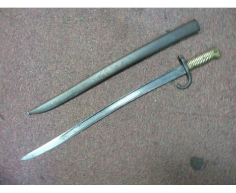 A French Chassepot bayonet (dated 1871) having a ribbed brass handgrip  the blade 22.5''L in a steel scabbard