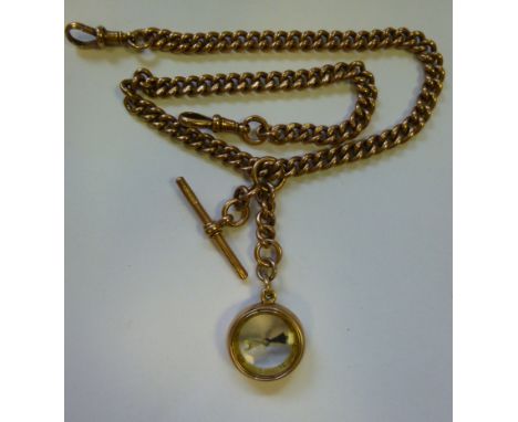 A 9ct gold kerb link, double Albert with a sliding ring and pendant compass 