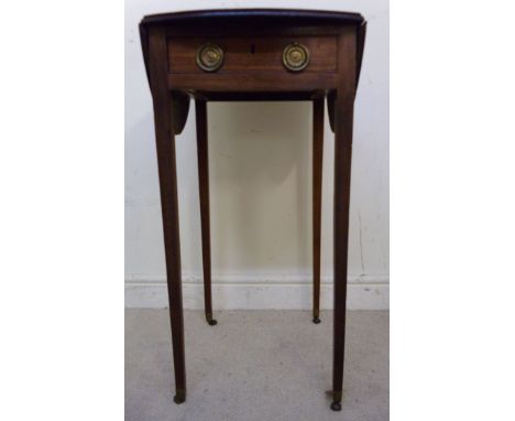 An early 19thC mahogany Pembroke table, having an oval top, over an end drawer with brass ring handles, on circular backplate