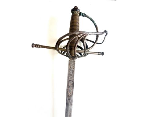 Vintage  Rapier, wirebound grip, 4 concentric rings increasing in size toward pommel, largest ring connecting to knuckle bow,
