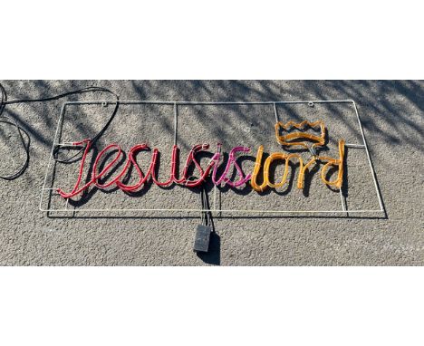 "Jesus is Lord" light up sign measures approximately 22 inches wide 56 inches wide, untested