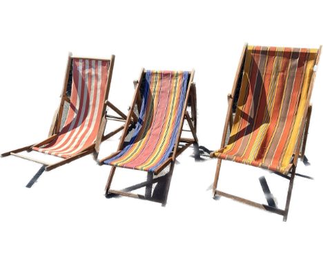 Three vintage folding deck chairs 