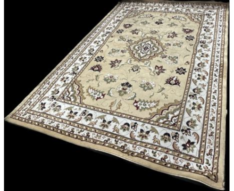 Large vintage rug measures approximately 114 inches long x 79 wide