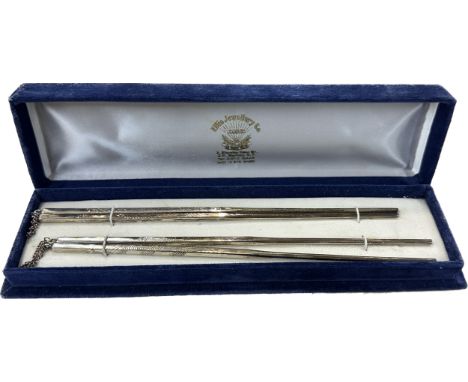 Set of vintage cased silver chop sticks total weight 120 grams