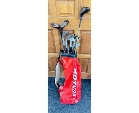 Vintage Dunlop Golf bag and a selection of assorted golf clubs includes Wilson etc 