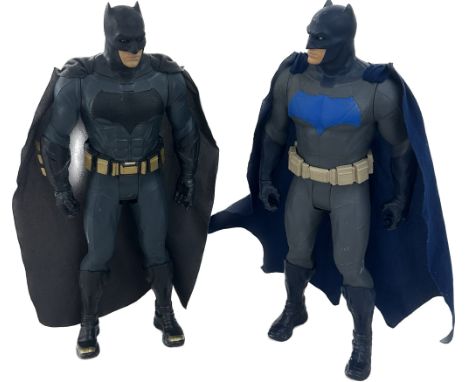 Two tall Batman figurines approximate height 20 inches