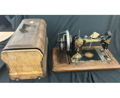 Vintage Jones cased sewing machine 