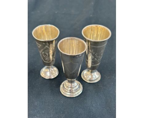Three Miniature Russian silver kiddush cups, total weight 64 grams height 3 inches