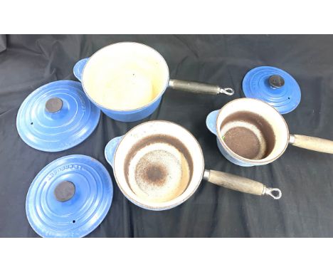 Selection of vintage blue Le Creuset pots 
