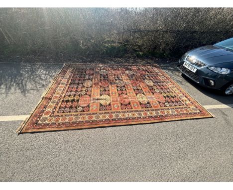 Large carpet measures approximately 9ft by 12ft