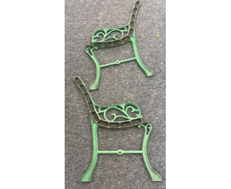 Pair green cast bench ends 