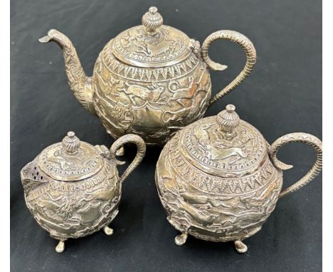 Fine Thai 800 grade silver three piece tea service, no marks, consists of a tea Pot, lidded sugar pot and a cream jug, total 