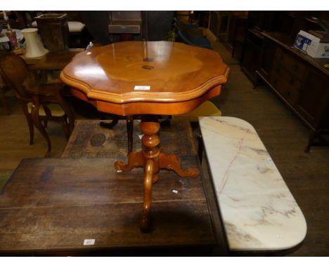 An Italian inlaid pedestal table raised on turned column and tripod base 