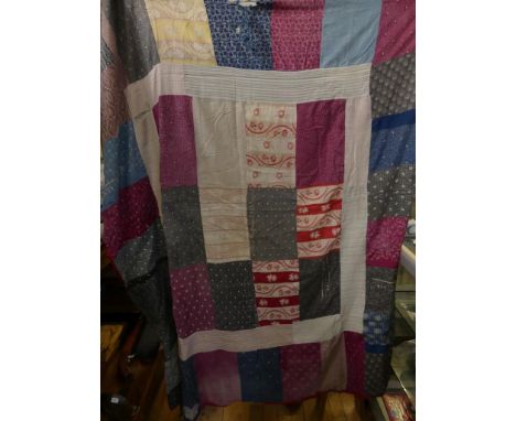 A vintage patchwork tablecloth 