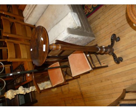 A mahogany torchere plant stand on tripod base 