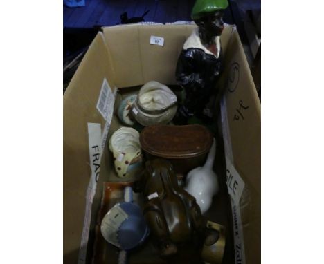 A mixed lot comprising a Royal Doulton character jug 'The Poacher' a painted plaster work figure of a black boy, small table 