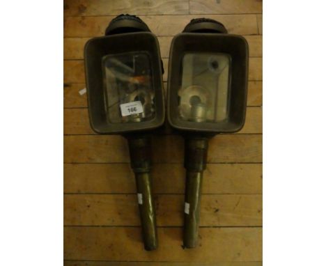 A pair of vintage brass and iron coach lamps marked S Cund Wolverhampton patent no. 20 