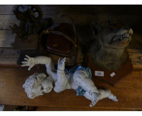 A mixed lot comprising a fox mask on oak shield back, an Agfa Movexar movie camera, a cast base sewing machine and an Algora 
