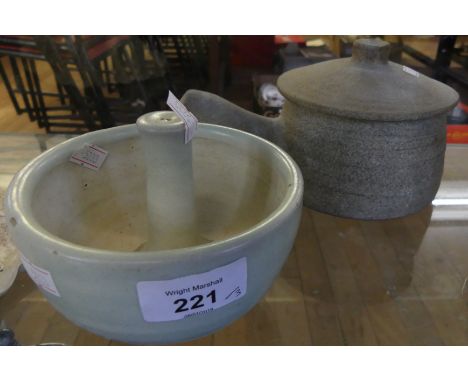 A small Bernard Leach studio pottery handled cooking pot together with a further indistinctly marked pastle and mortar (3) 