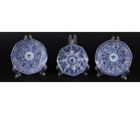 Three porcelain 8-sided plates with rich lotus decoration in borders and a smaller one (marked on the bottom) China Kangxi/Yo