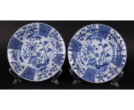 Two porcelain plates with peony and bamboo decor in the center and four-compartment outer edge floral decor. China Kangxi/Yon