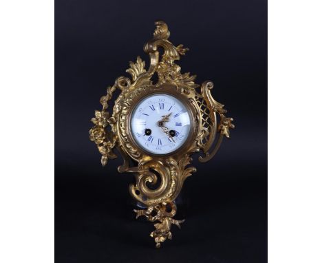 A Louis XV style cartel clock with enamel dial, ca. 1890. Movement tested and in working order.H.: 40 cm. 
