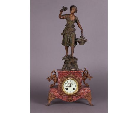 A mantel clock with clock image after Ernest Rancoulet (1870 - 1915), "Cueilette" (= The picker). about 1900.H.: 56 cm. 