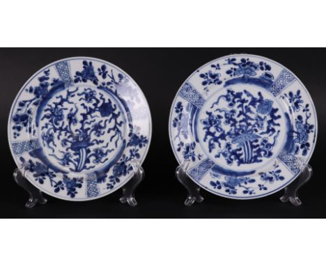 Two porcelain plates with rich floral decoration and four-sided exterior with floral decor, marked on the back with a Taoist 