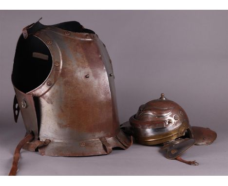 A decorative cuirass and a replica Roman helmet. 20th century.