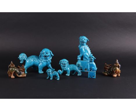 A lot of seven ceramic Foo-dogs. China, 20th century.