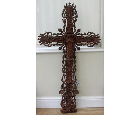 Beautifully Ornate French Cast Iron Cross c1890. Decorated with ivy leaves, flowers and a prominent figure. A great artistic 