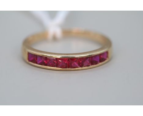 Ladies 9ct Gold Ruby Channel set ring Size O 1.9g total weight 