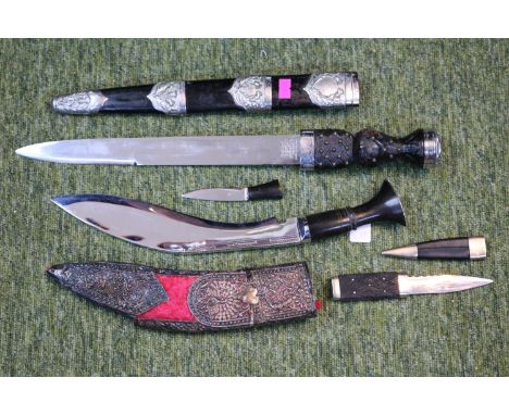 A Scottish piper's dirk with white metal queen's crown pommel, marked Wilkinson Sword Co Ltd London, Made In England and whit