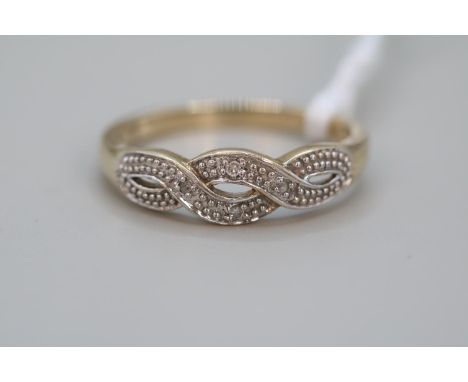 9ct Gold Diamond set wavy design ring Size O 