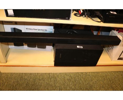 Samsung Bass Speaker and a Samsung Sound Bar 