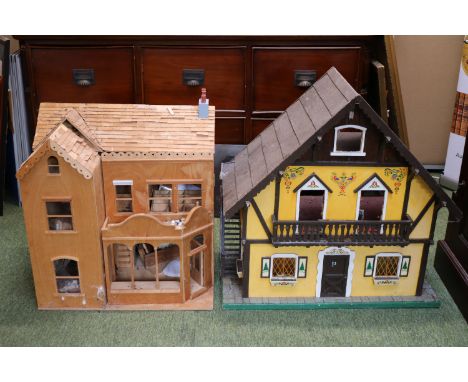 2 large partially constructed vintage dolls houses.